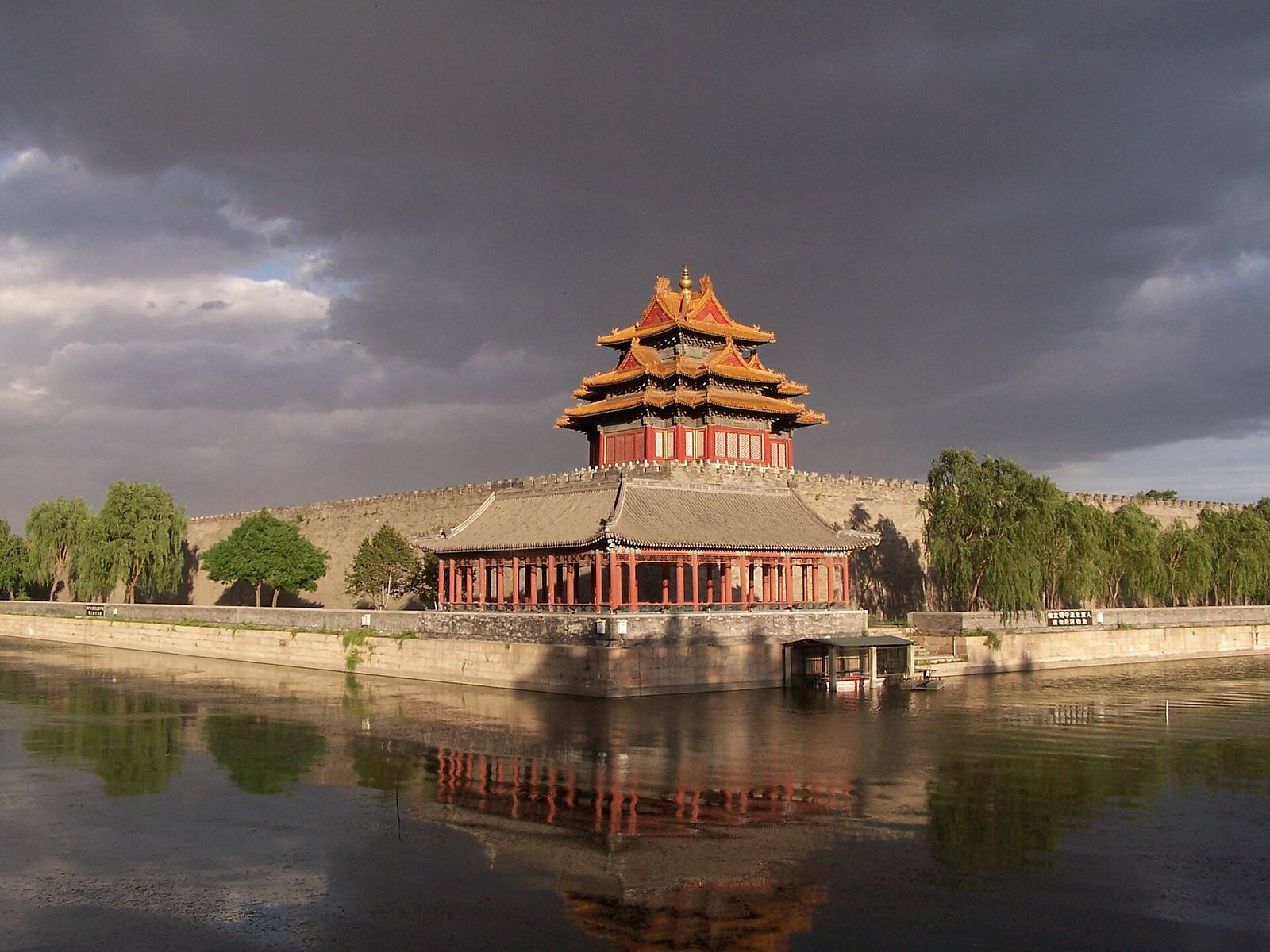 Corner tower of the Forbidden City reflected in the moat